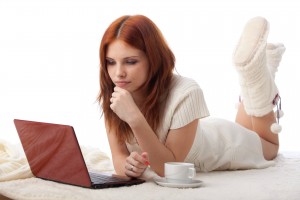girl-at-laptop-with-coffee1080